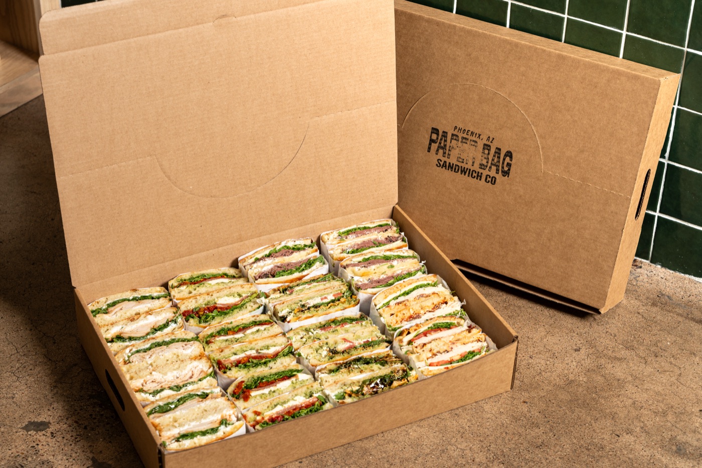 Paper Bag Sandwich Co. catering box filled with fresh sandwiches