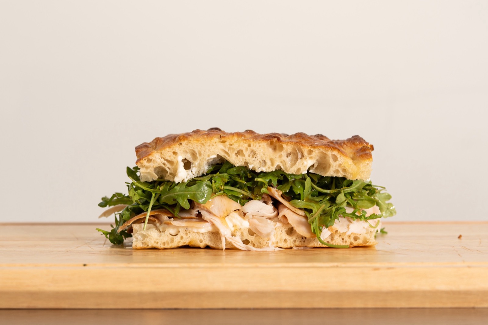 Hall Pass sandwich — turkey, whipped ricotta and hot honey on schiacciata