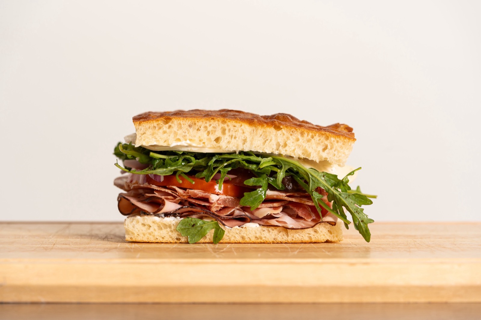 Group Project sandwich — ham, prosciutto, salami and hot capicola on schiacciata